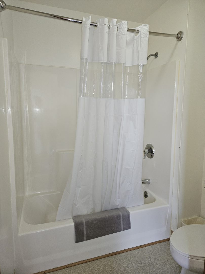 Shower in standard double Queen bed room